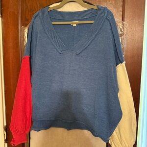 POL Blue V-Neck Sweater with Red and Cream Sleeves